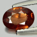 Натуральный красный Циркон овал 6.8х4.9мм 0.81ct