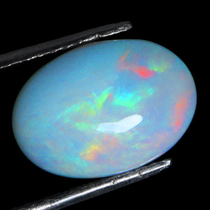 Натуральный благородный Опал овал 15.4х10.9мм 4.12ct Натуральный благородный Опал овал 15.4х10.9мм 4.12ct