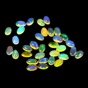 Натуральный благородный Опал овал 5х3мм 0.16ct