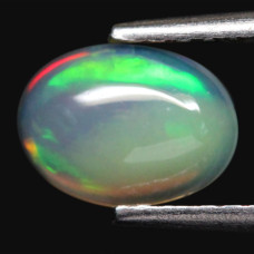 Натуральный темный благородный Опал овал 7.0х5.2мм 0.51ct