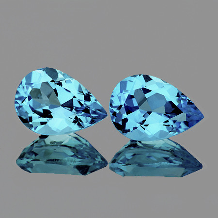 Натуральный голубой скай блю Топаз груша пара 9х6мм 3.60ct