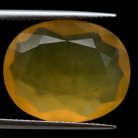 Натуральный желтый Опал овал 20.2х16.5мм 12.78ct