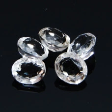 Натуральный белый Топаз овал 6.1х5.1 - 6.4х5.5мм 0.84ct