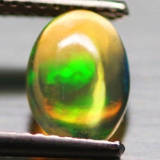 Натуральний шляхетний Опал овал 7.9х5.9мм 0.75ct