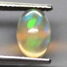 Натуральний шляхетний Опал овал 9.1х6.0мм 1.02ct