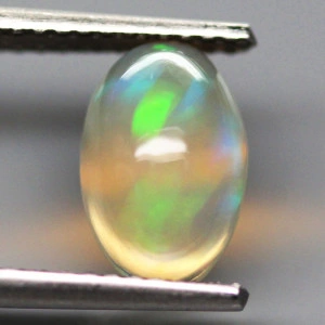 Натуральный благородный Опал овал 9.1х6.0мм 1.02ct