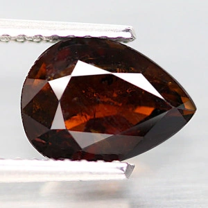 Натуральный коричневый Турмалин груша 8.6х6.5мм 1.39ct
