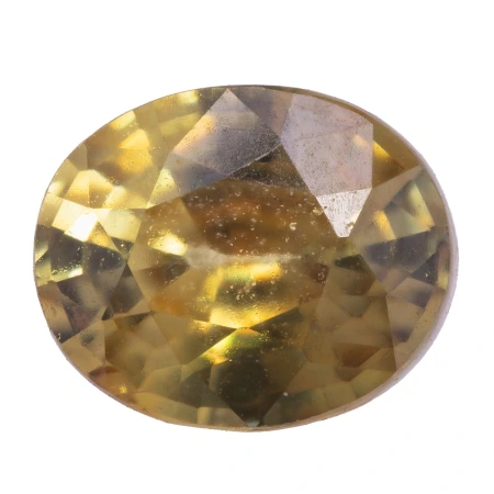 Натуральный Сфен овал 6.5х5.4мм 0.88ct Натуральный Сфен овал 6.5х5.4мм 0.88ct
