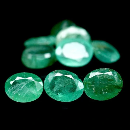 Натуральний Смарагд овал 6.6x5.3 - 6.9x5.6мм 0.81ct Натуральний Смарагд овал 6.6x5.3 - 6.9x5.6мм 0.81ct