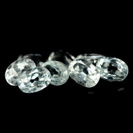 Натуральный белый Топаз овал 7.0x5.1 - 7.3x5.3мм 1.05ct