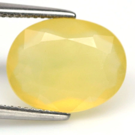 Натуральный желтый Опал овал 14.4x11.3мм 4.67ct
