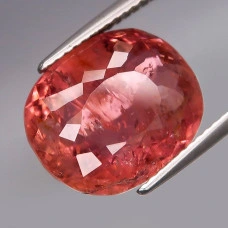 Натуральный Рубеллит падпараджа овал 13.8x11.4мм 9.02ct