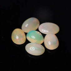 Натуральний благородний Опал овал 7x5мм 0.44ct