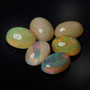 Натуральний благородний Опал овал 6.9х4.9 - 7.2х5.2мм 0.55ct