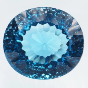 Натуральний блакитний свісс Топаз овал 18.8x16.8мм 31.19ct