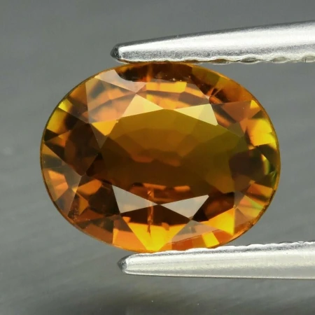 Натуральный желтый Турмалин 7.0x5.7мм овал 0.73ct Натуральный желтый Турмалин 7.0x5.7мм овал 0.73ct