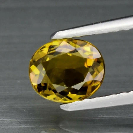 Натуральний жовтий Турмалін овал 6.3х5.2мм 0.71ct Натуральний жовтий Турмалін овал 6.3х5.2мм 0.71ct