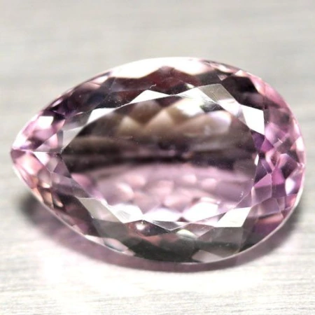 Натуральный Аметрин груша 10.8x13.1мм 12.01ct