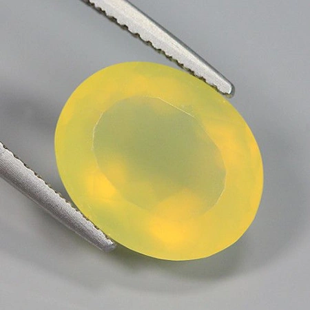 Натуральный желтый Опал овал 13.1x10.8мм 4.60ct