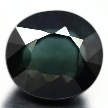 Натуральный Индиголит овал 7.2x6.6мм 1.60ct