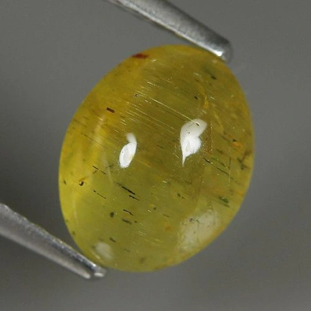 Натуральний Апатит з кошачим оком овал 9.0x7.4мм 3.13ct