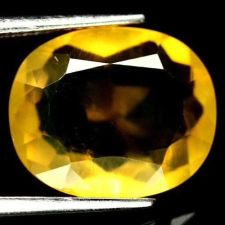 Натуральний жовтий Опал овал 15.1x12.5мм 6.18ct