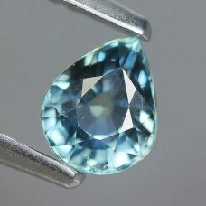 Натуральный не гретый Сапфир со сменой цвета груша 5.4x4.4мм 0.61ct