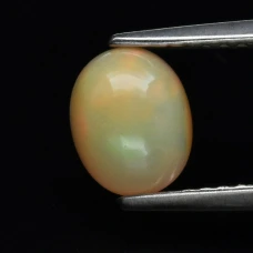Натуральний благородный Опал овал 7.2x5.8мм 0.59ct