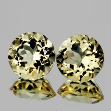 Натуральний Лабрадорит жовтий круг пара 7мм 2.33ct
