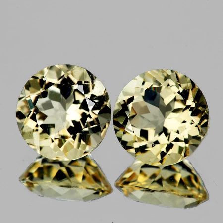 Натуральний Лабрадорит жовтий круг пара 7мм 2.33ct