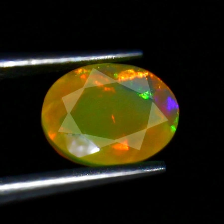 Натуральный благородный Опал овал 8.7х6.8мм 1.24ct