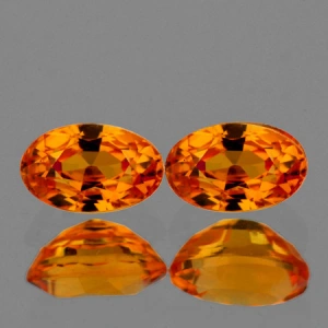 Натуральный оранжевый Сапфир овал пара 5х3мм 0.69ct Натуральный оранжевый Сапфир овал пара 5х3мм 0.69ct