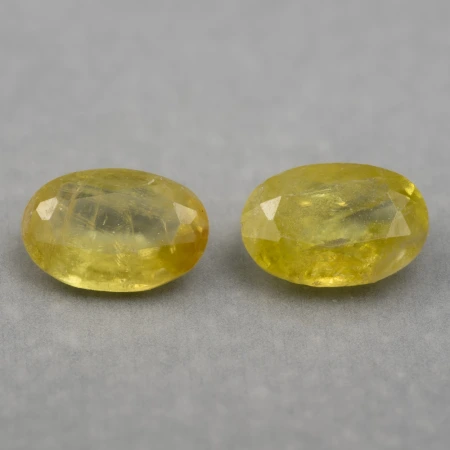 Натуральный Сфен овал 6.2х4.2мм пара 1.01ct Натуральный Сфен овал 6.2х4.2мм пара 1.01ct