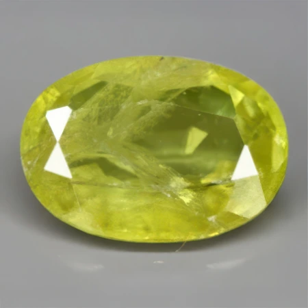 Натуральный Сфен овал 6.2х4.4мм 0.52ct Натуральный Сфен овал 6.2х4.4мм 0.52ct