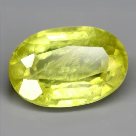 Натуральный Сфен овал 6.1х4.0мм 0.50ct Натуральный Сфен овал 6.1х4.0мм 0.50ct