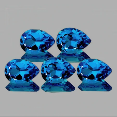 Натуральний блакитний лондон Топаз груша 7х5мм 0.86ct Натуральний блакитний лондон Топаз груша 7х5мм 0.86ct