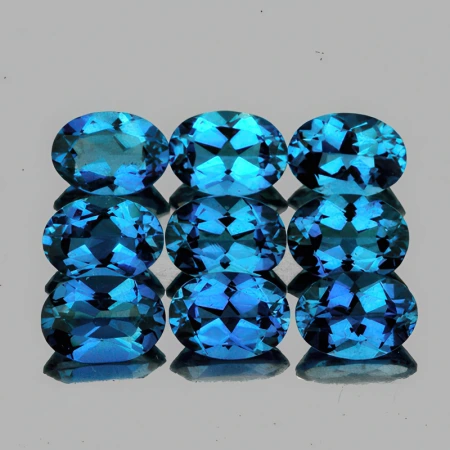 Натуральный голубой лондон Топаз овал 5х4мм 0.42ct Натуральный голубой лондон Топаз овал 5х4мм 0.42ct