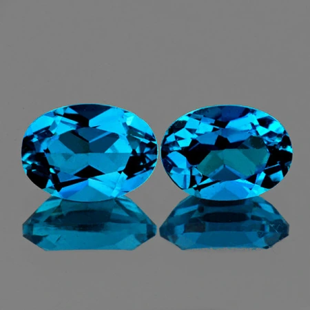 Натуральный голубой лондон Топаз овал 7х5мм 0.85ct Натуральный голубой лондон Топаз овал 7х5мм 0.85ct